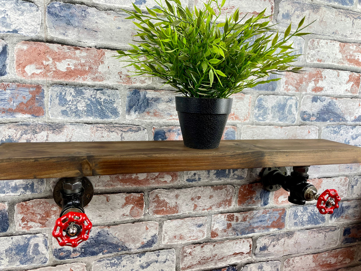 20cm x 10cm handmade industrial style shelf with metal pipework brackets and valves.

Made from solid wood and metal industrial style pipework, this unit is perfect for industrial or loft living style home decor and suitable to use anywhere around the home. Free UK delivery  by Splintered Furniture