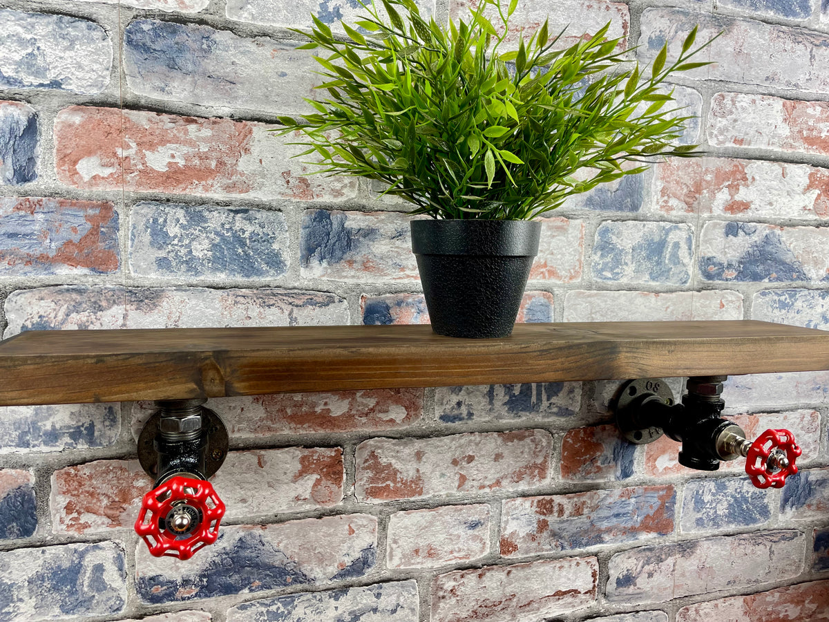 20cm x 10cm handmade industrial style shelf with metal pipework brackets and valves.

Made from solid wood and metal industrial style pipework, this unit is perfect for industrial or loft living style home decor and suitable to use anywhere around the home. Free UK delivery  by Splintered Furniture