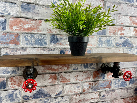 20cm x 10cm handmade industrial style shelf with metal pipework brackets and valves.

Made from solid wood and metal industrial style pipework, this unit is perfect for industrial or loft living style home decor and suitable to use anywhere around the home. Free UK delivery  by Splintered Furniture