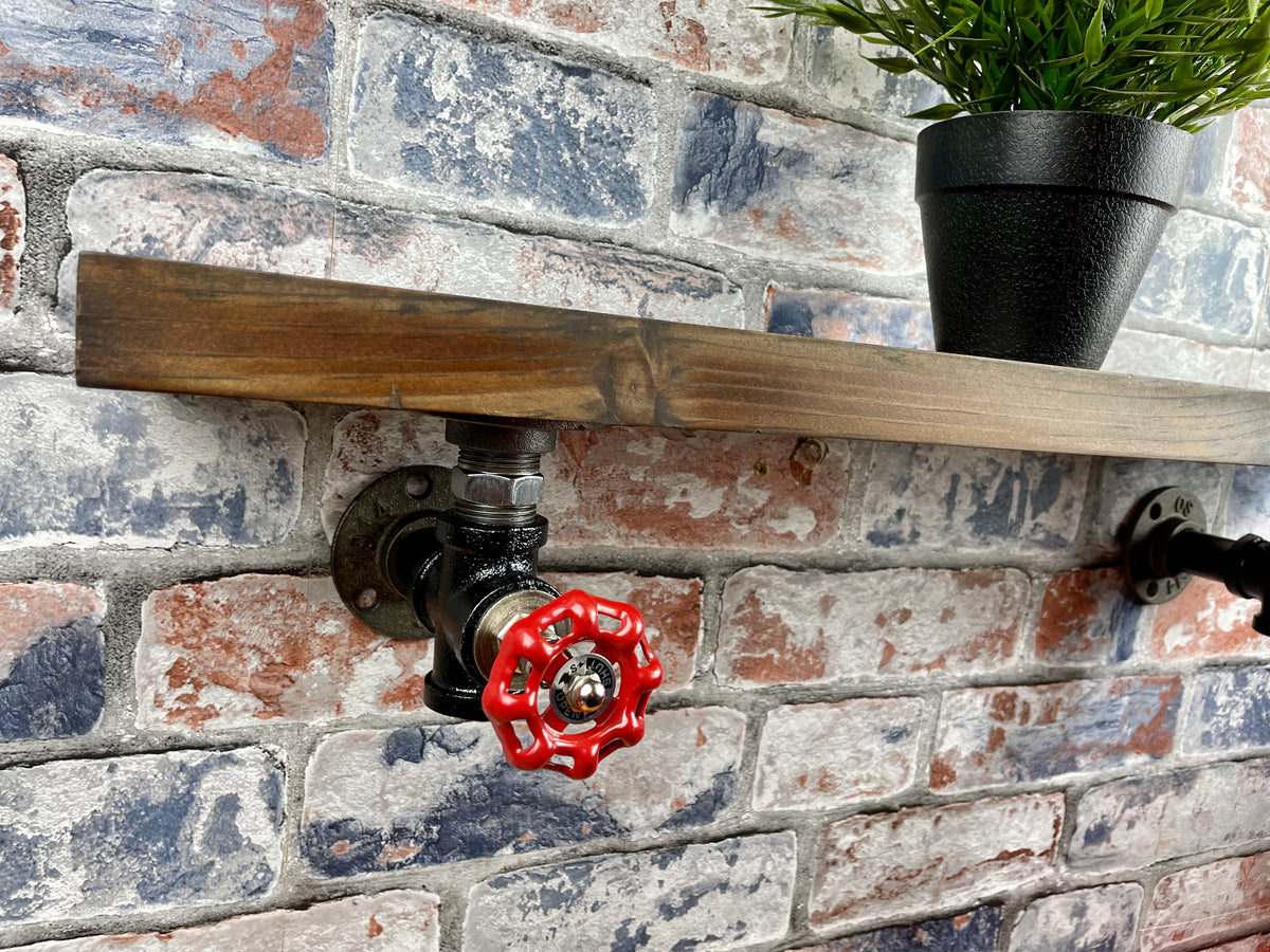 20cm x 10cm handmade industrial style shelf with metal pipework brackets and valves.

Made from solid wood and metal industrial style pipework, this unit is perfect for industrial or loft living style home decor and suitable to use anywhere around the home. Free UK delivery  by Splintered Furniture