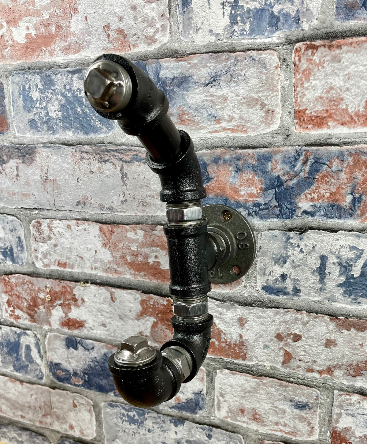 Industrial Style Metal Pipework Coat Hooks.

Chunky and super sturdy, these metal coat hooks come fully built and ready to attach to your wall.