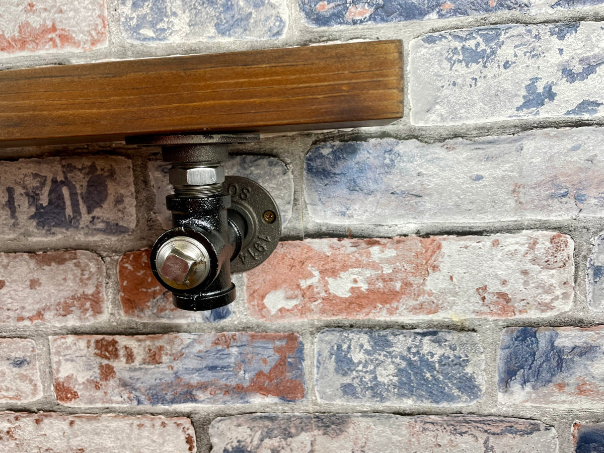 20cm x 10cm handmade industrial style shelf with metal pipework brackets.

Made from solid wood and metal industrial style pipework, this unit is perfect for industrial or loft living style home decor and suitable to use anywhere around the home.