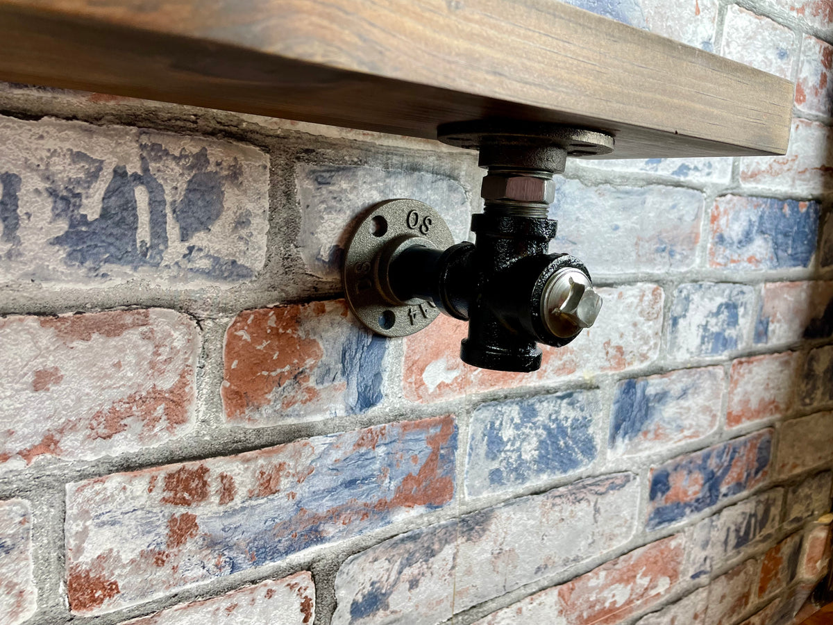20cm x 10cm handmade industrial style shelf with metal pipework brackets.

Made from solid wood and metal industrial style pipework, this unit is perfect for industrial or loft living style home decor and suitable to use anywhere around the home.