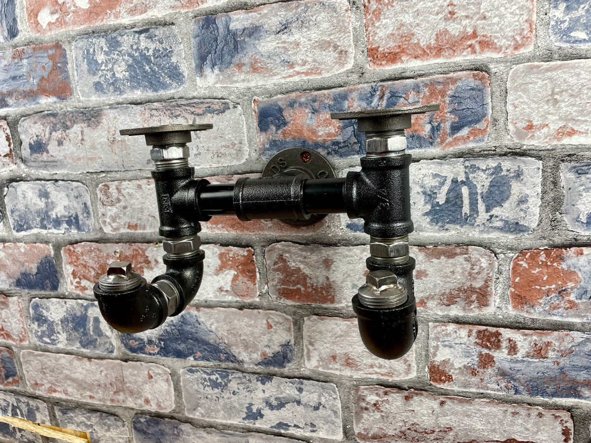Industrial Style Metal Pipework Coat Hooks Set

Chunky and super sturdy, these metal coat hook sets come fully built and ready to attach to your wall. Perfect from coats, scarves, hats, keys and more.